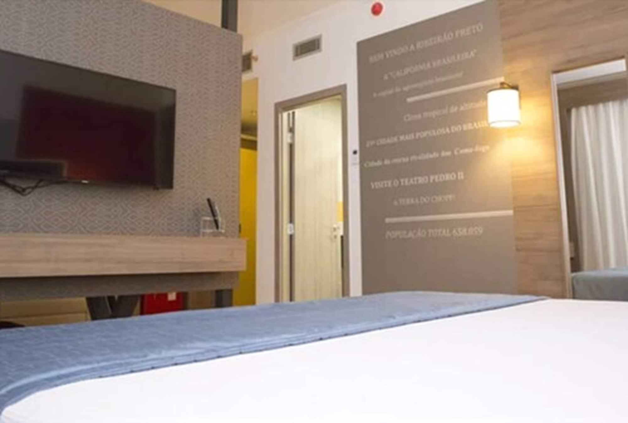 Hotel Tryp By Wyndham Ribeirão Preto Esterno foto A room at the hotel